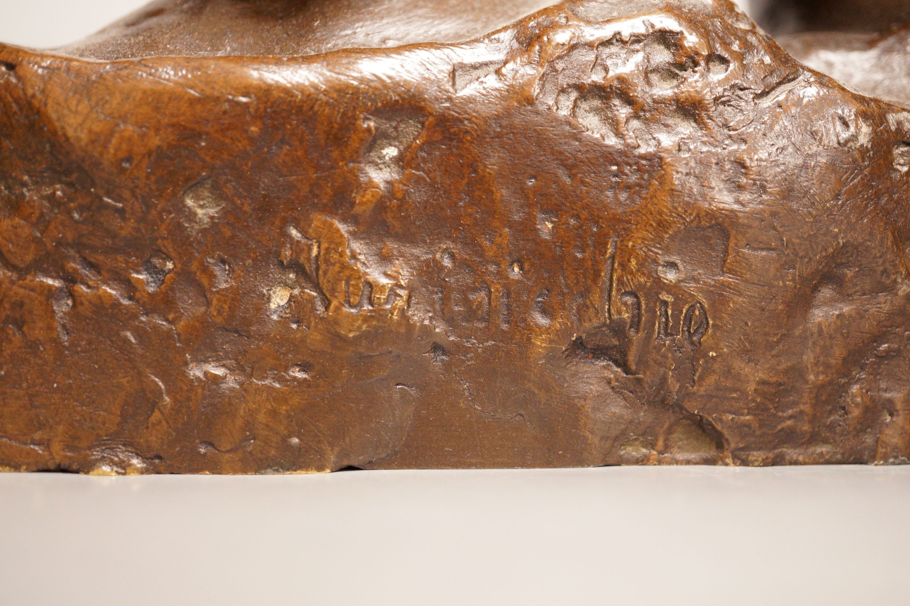 Vincenzo Aurisicchio, (Napoli 1855-1926) a bronze bust group of five smiling children, signed to reverse 40cm wide